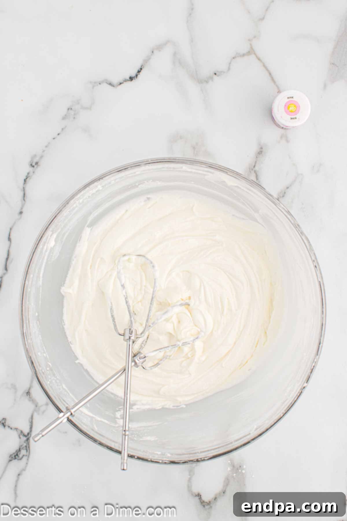 Milk added to butter mixture in bowl.