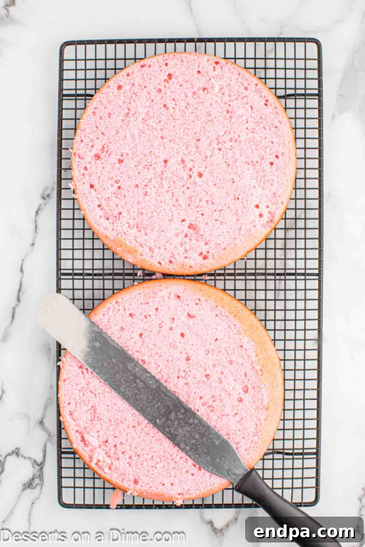 Cakes split open and cooling.