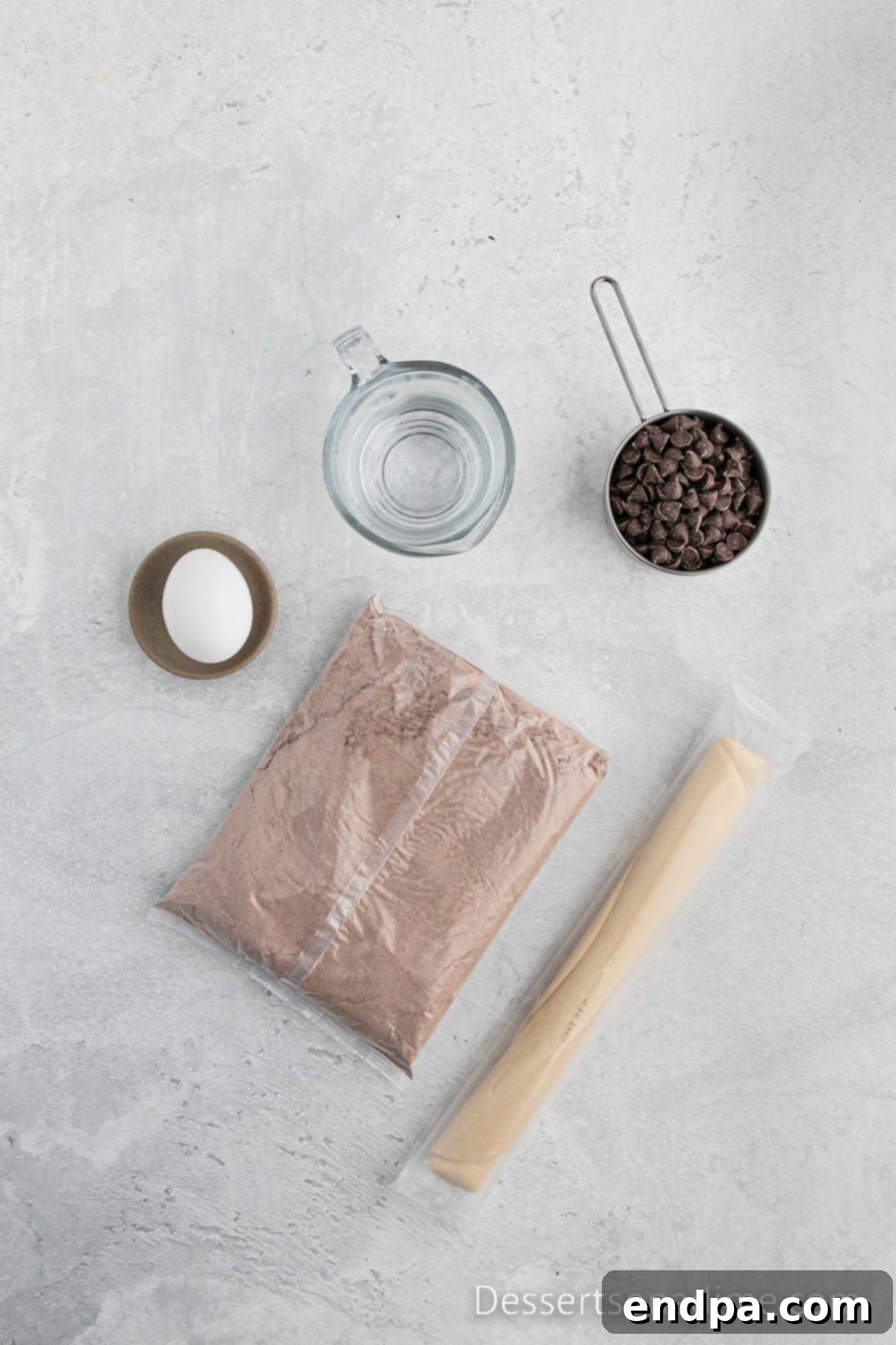 Ingredients for brownie pie - pie crust, brownie mix, water, egg, chocolate chips