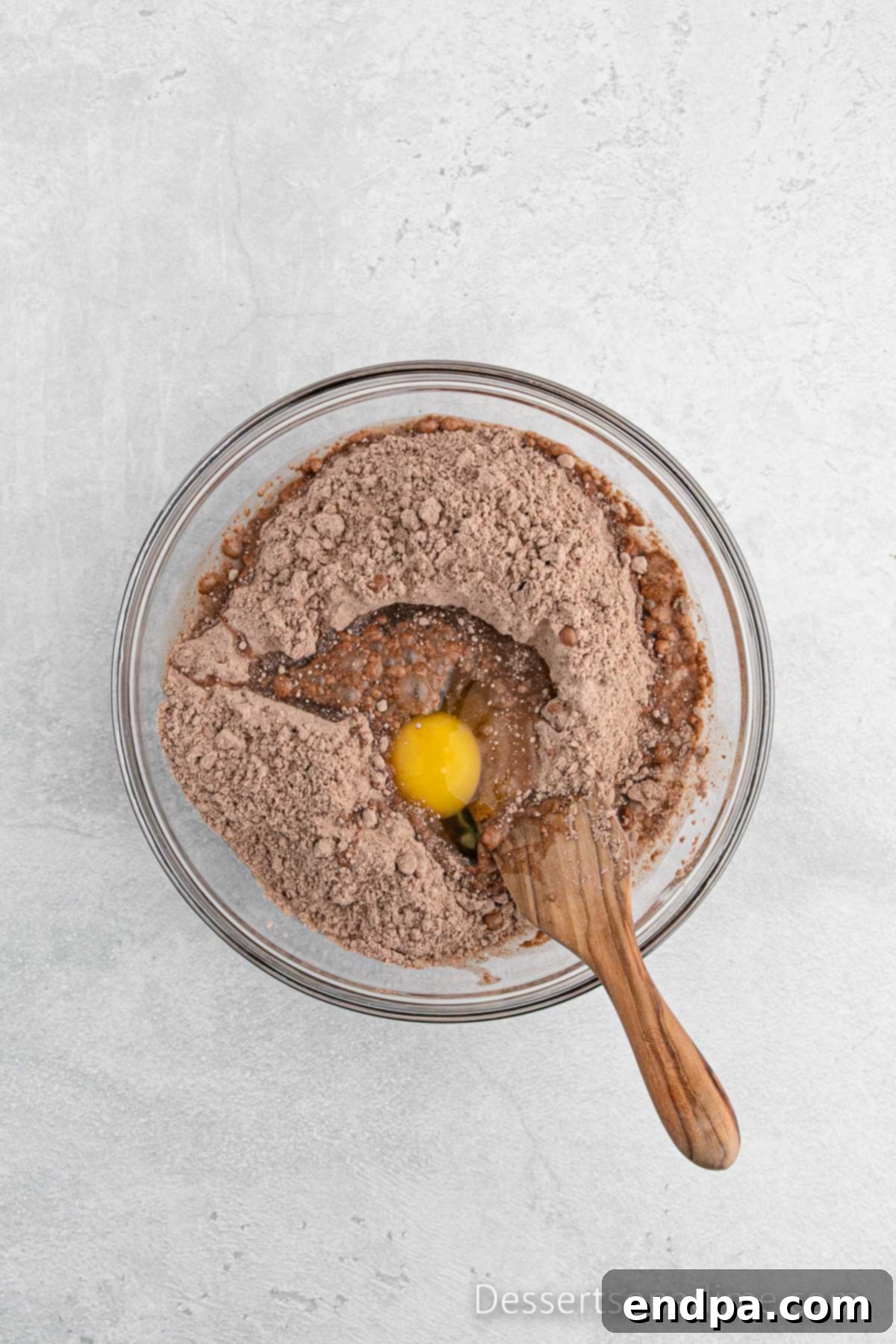 Mixing bowl with brownie batter combined.