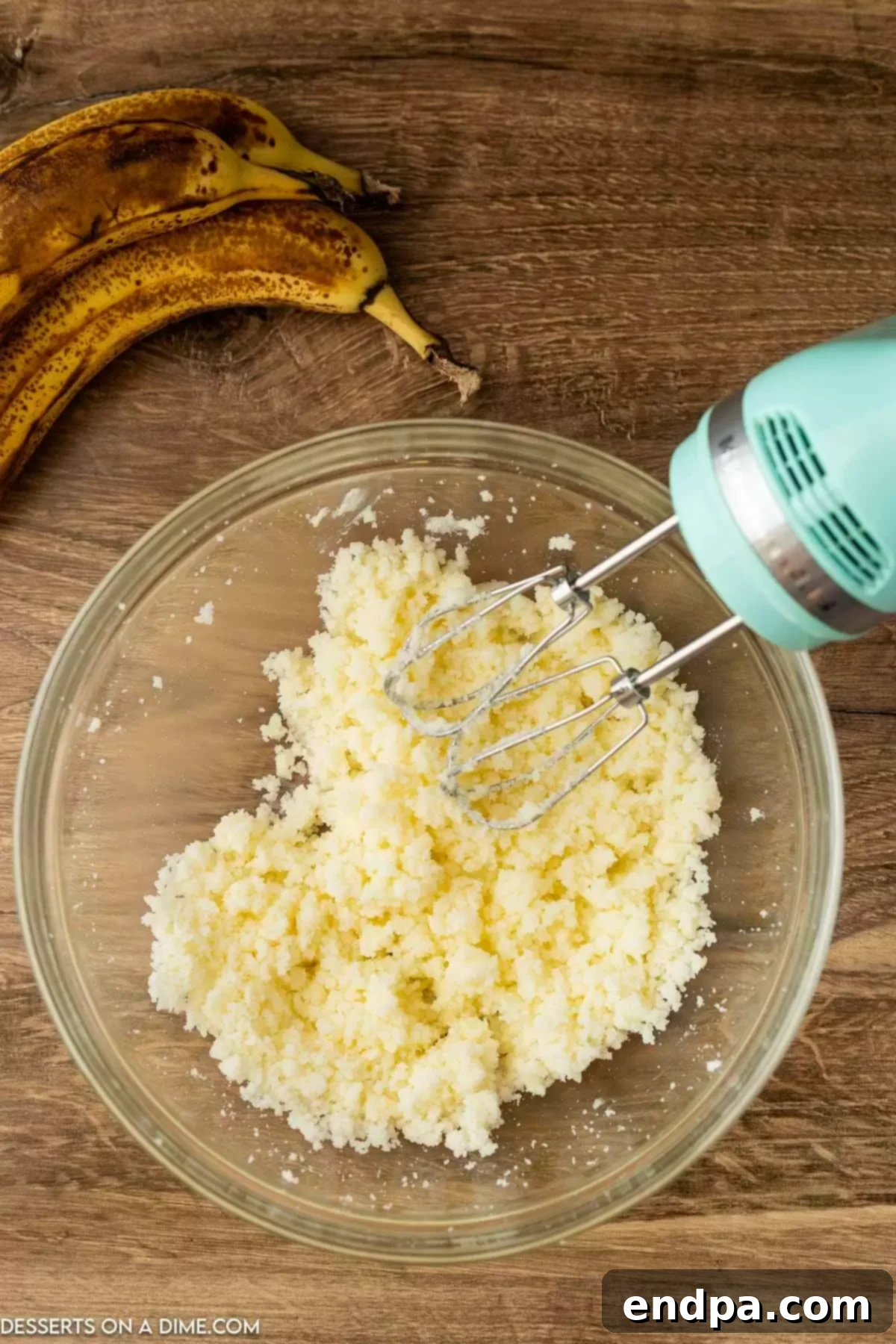 Decadent Banana Bread Brownies 4 Mixing bowl with butter and sugar.