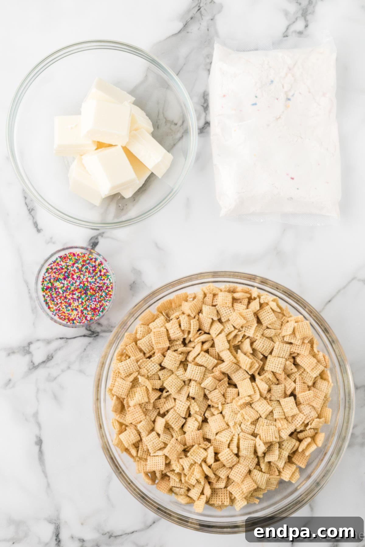 Festive Funfetti Snack Mix 3 Four key ingredients for Funfetti Puppy Chow: Rice Chex cereal, almond bark, multi-colored sprinkles, and Funfetti cake mix