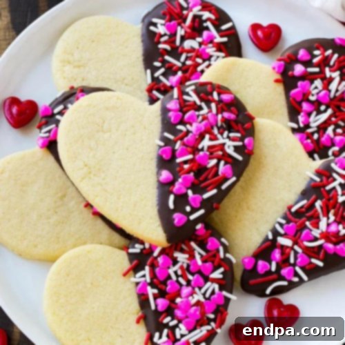 Dark chocolate dipped heart cookies with sprinkles