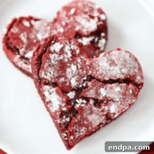 Red Velvet Crinkle Cookies in heart shapes