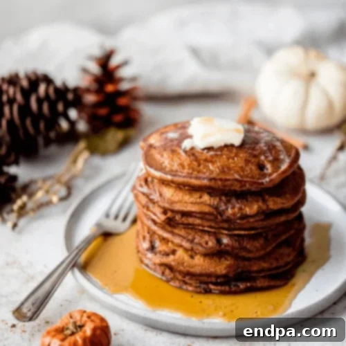 Gingerbread Pancakes drizzled with maple syrup and spices.