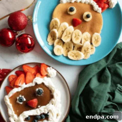 A festive Santa Pancake decorated with banana, berries, and whipped cream.