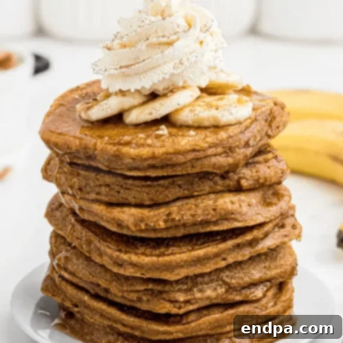 Sweet Potato Pancakes with fresh fruit and syrup.