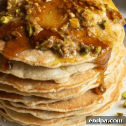 Pistachio Pancakes with pistachio butter and chopped pistachios.