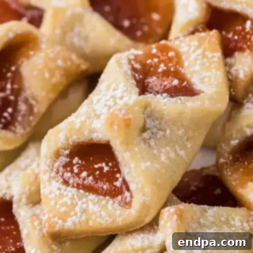 Fancy Strawberry Pinch Cookies with cream cheese and jam