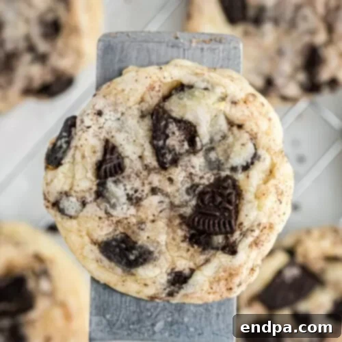Soft and chewy Oreo Cheesecake Cookies with crushed Oreos