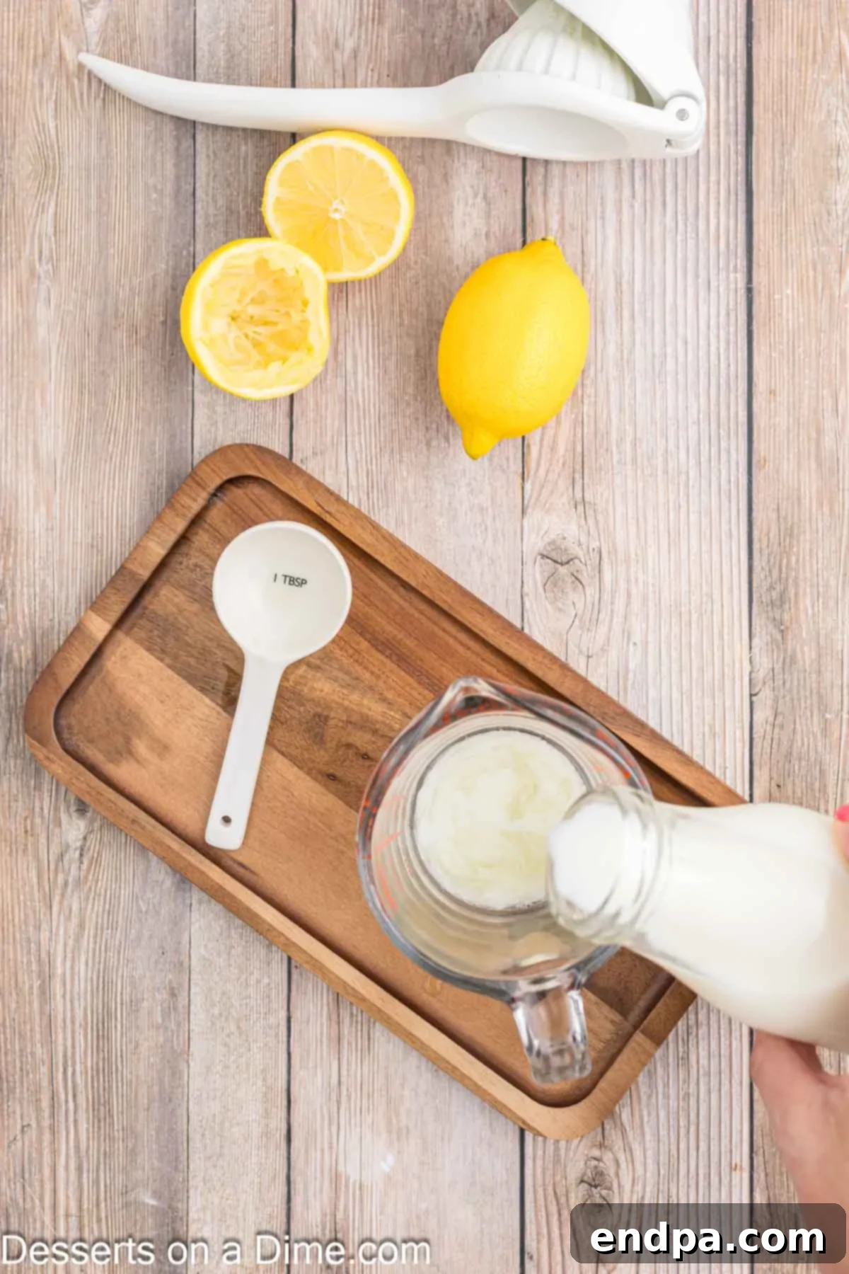 Milk poured into measuring cup. 