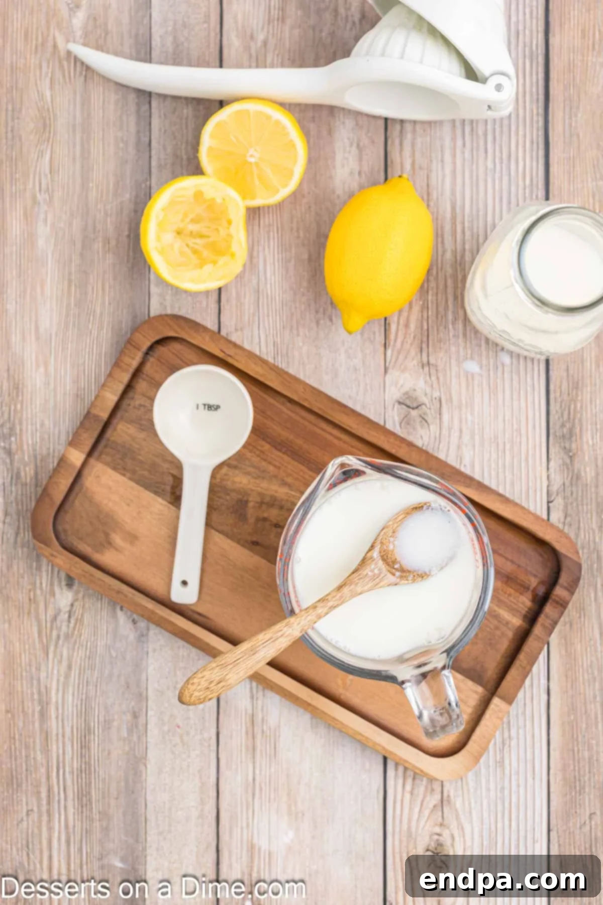 Milk stirred together in a measuring cup. 