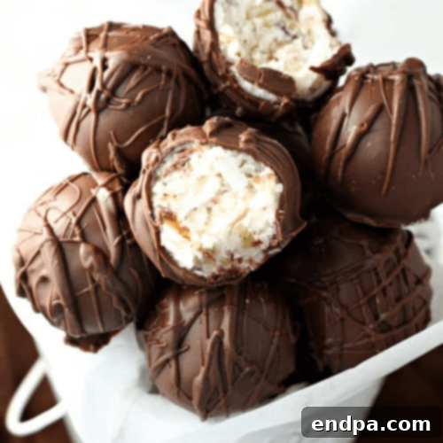 Coconut Pecan Truffles on a white plate.