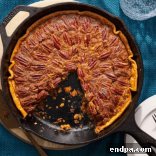 Utterly Deadly Southern Pecan Pie in a cast iron skillet.