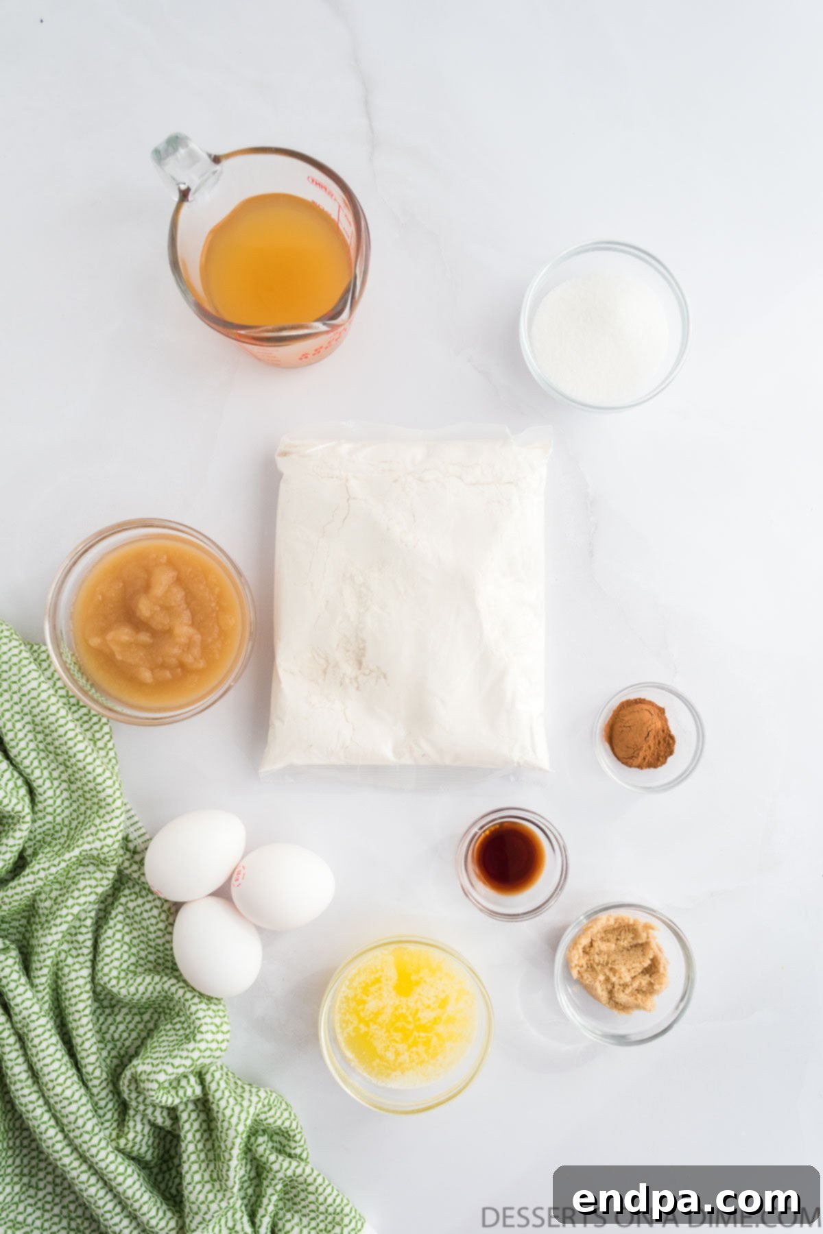 Autumn Apple Cider Bundt 3 Ingredients for Apple cider bundt cake- cake mix, apple cider, applesauce, eggs, cinnamon, brown sugar, vanilla extract..