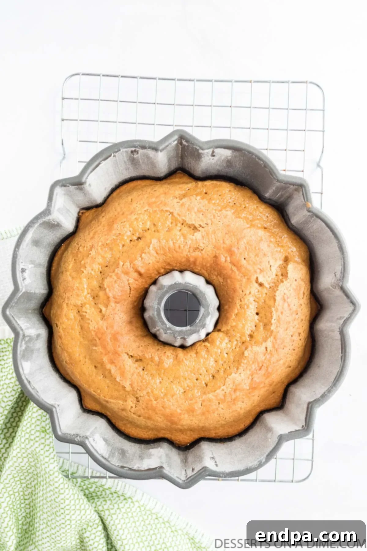 Autumn Apple Cider Bundt 8 Cake in pan cooling.