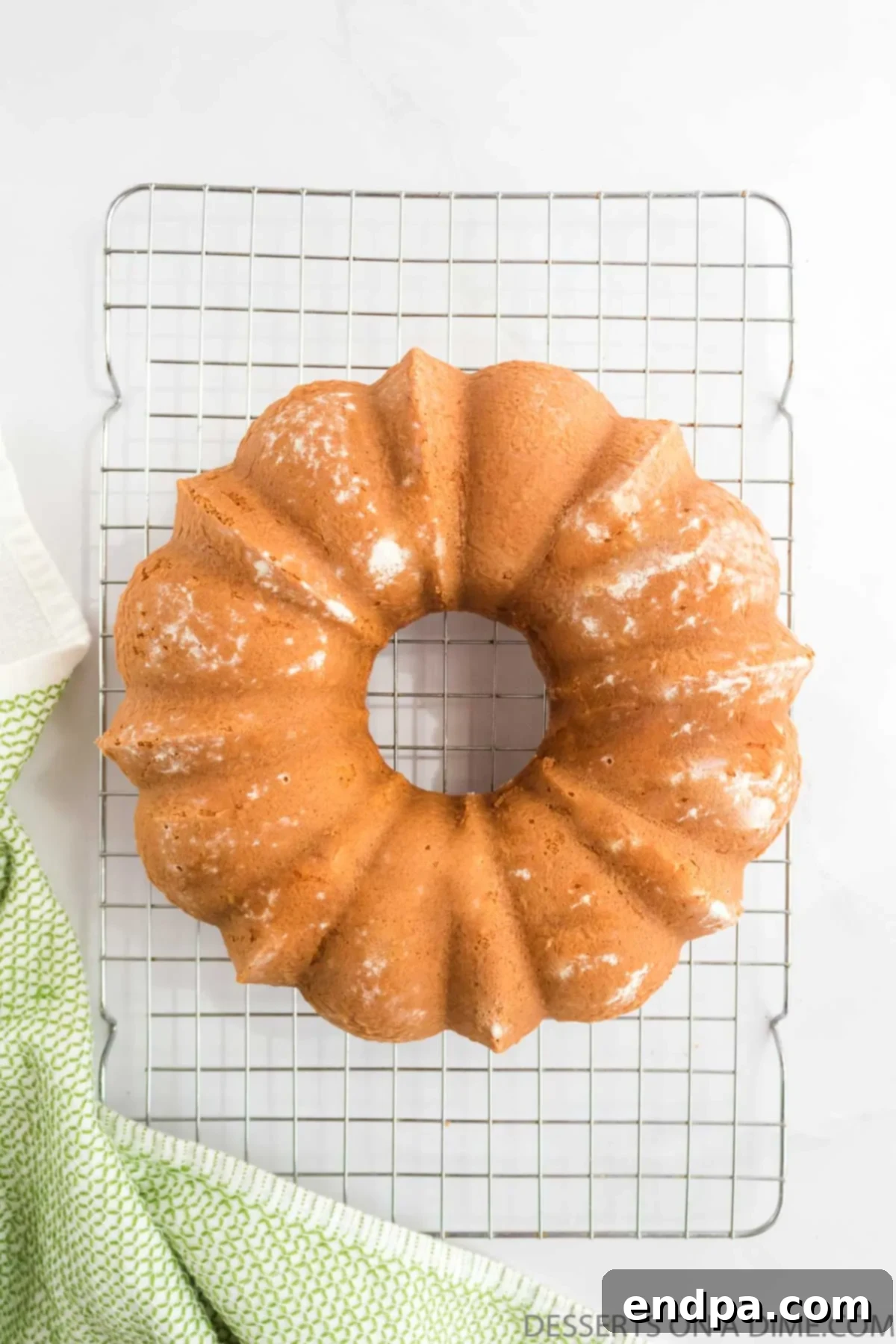 Autumn Apple Cider Bundt 9 Cake on cooling rack.