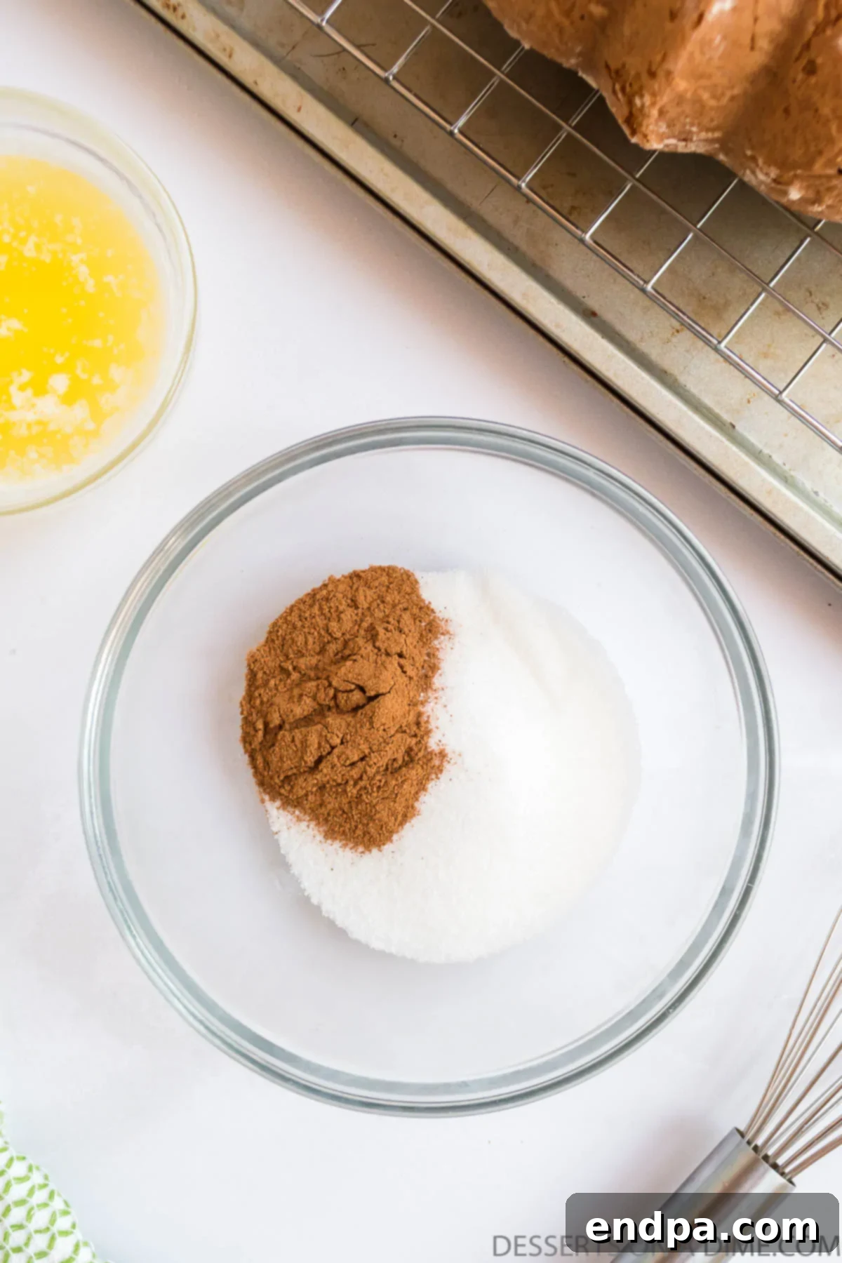 Autumn Apple Cider Bundt 10 Bowl with cinnamon and sugar for coating.