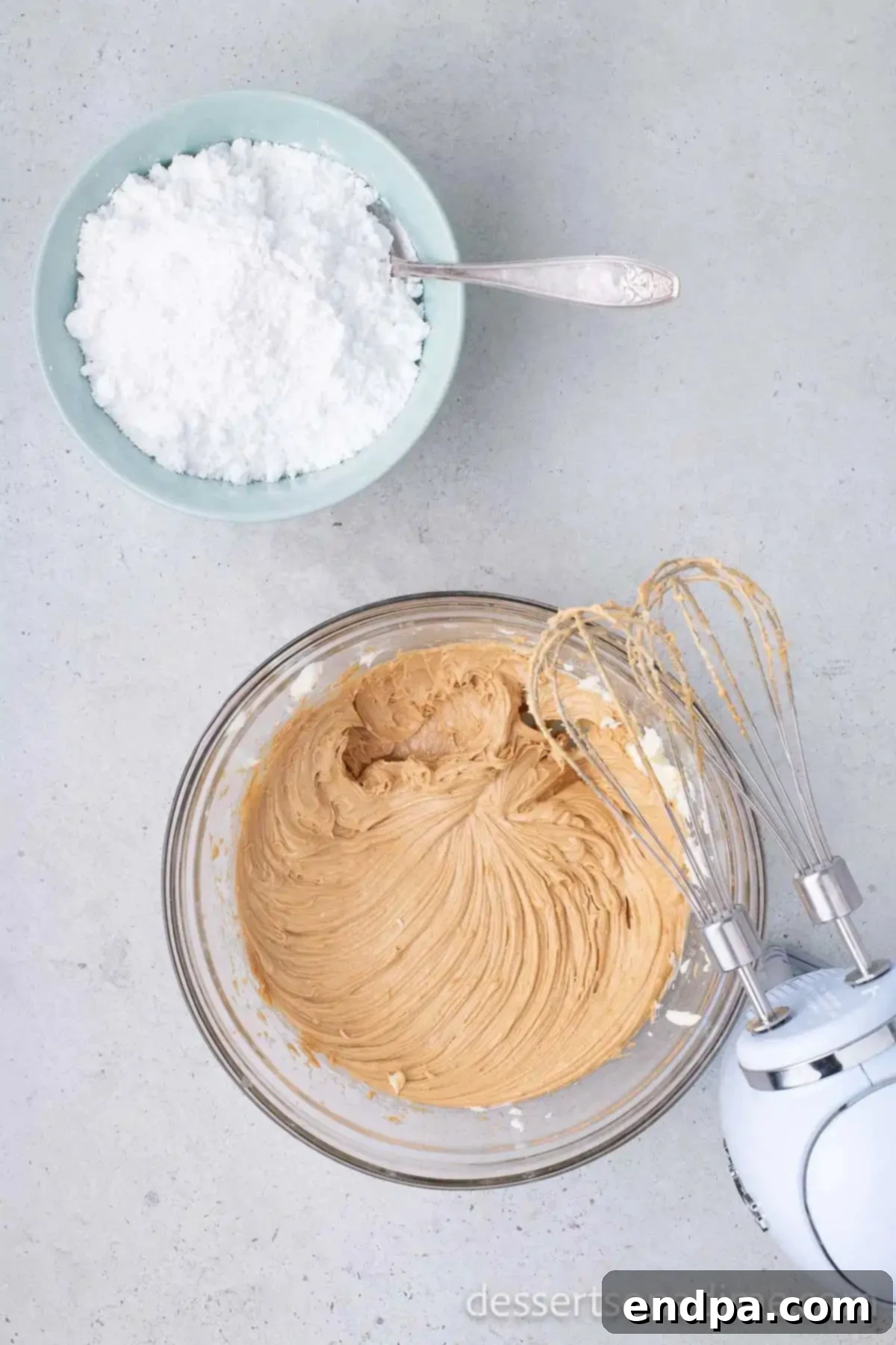 Buckeye Peanut Butter Delights 5 Smooth, well-combined peanut butter mixture in a bowl, ready for chilling.