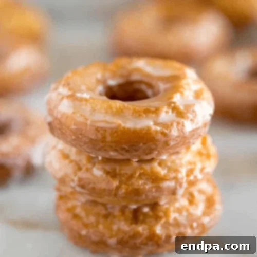 Old Fashioned Sour Cream Donuts with a sweet glaze, a timeless classic.