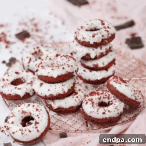 Red Velvet Donuts with cream cheese frosting, a rich and moist dessert.