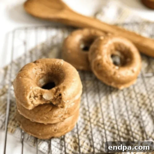 Spiced Pear Donuts with brown sugar glaze, a moist and fluffy dairy-free treat.