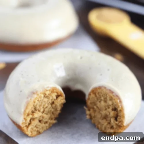 Baked Gingerbread Donuts with maple glaze, a festive and healthy treat.