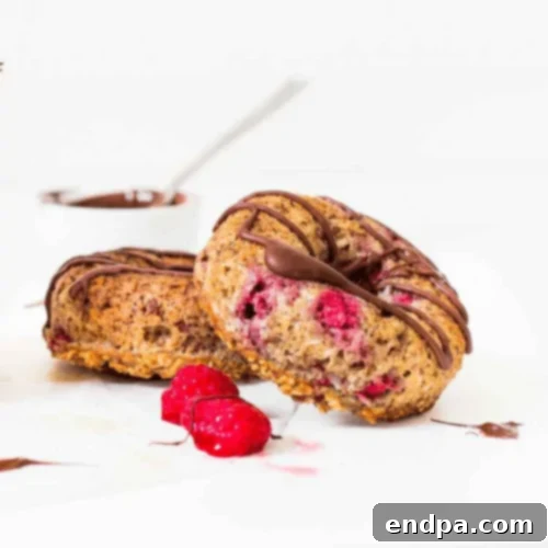 Baked Oatmeal Donuts with Raspberries, a healthy and delicious snack.