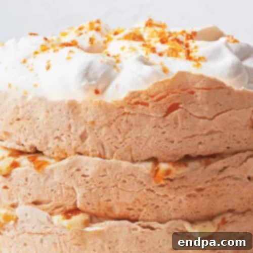 A light and airy Cloud Cake, delicately frosted and ready to serve.