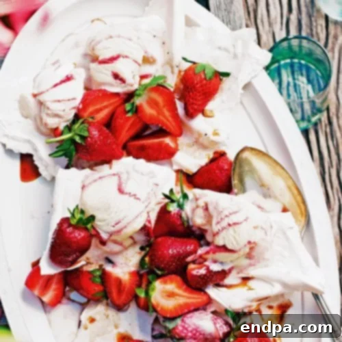 Delicate meringues served alongside fresh strawberries infused with pepper and vodka.