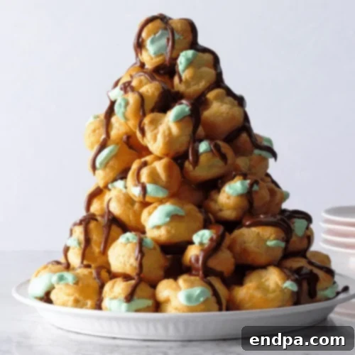 An impressive Creme de Menthe Cream Puff Tree, adorned with delicate cream puffs and green drizzle.