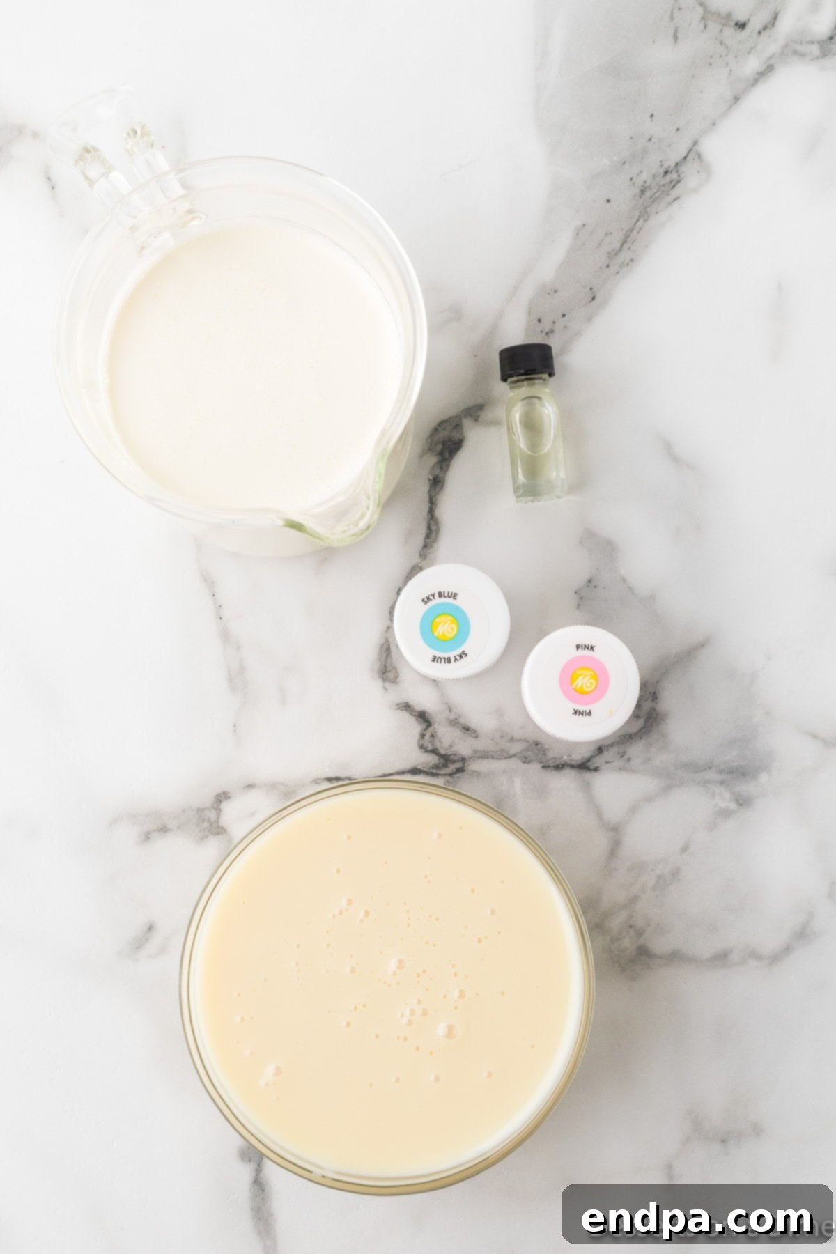 Ingredients for recipe - whipping cream, sweetened condensed milk, cotton candy flavoring, food coloring. 