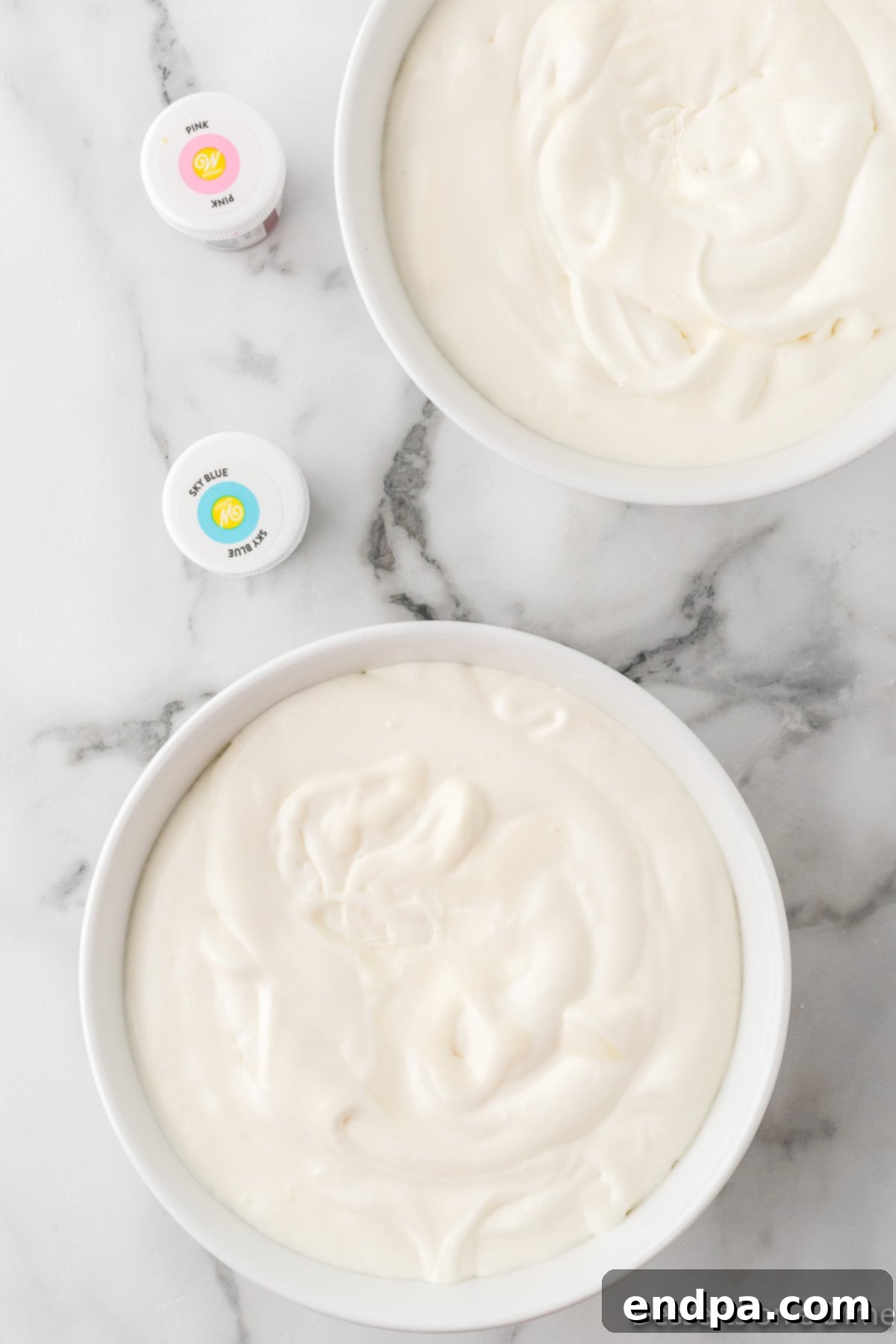 Mixture divided into 2 bowls. 