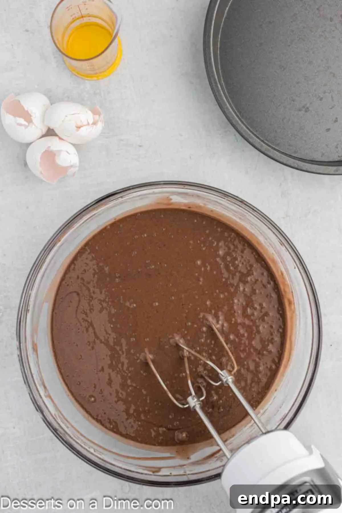 Game Day Goal: Baking a Winning Football Cake 4 Cake batter in mixing bowl.