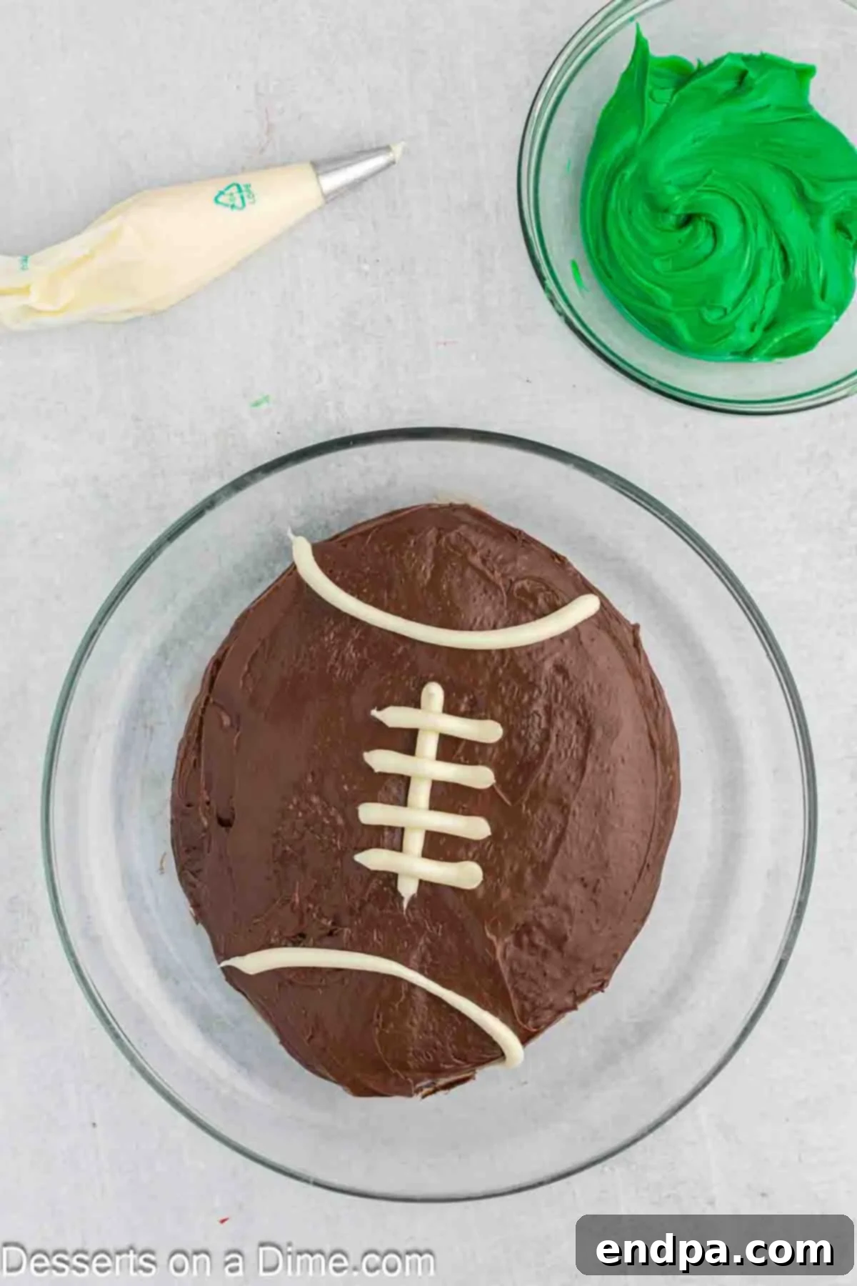 Game Day Goal: Baking a Winning Football Cake 10 White stripes added to football.