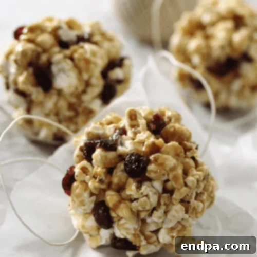 Maple Cranberry Popcorn Balls, featuring a warm, sweet, and tangy profile.