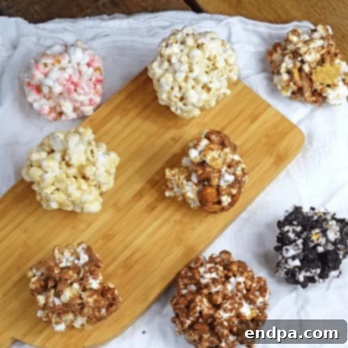 Bright and colorful Festive Popcorn Balls, made with marshmallows.
