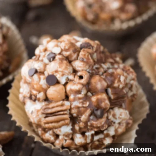 Turtle Popcorn Balls, combining marshmallows, caramel bits, and chocolate chips.
