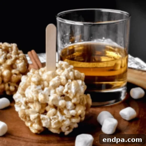 Cinnamon Buttered Rum Popcorn Balls, an adult treat with warm, spiced flavors.
