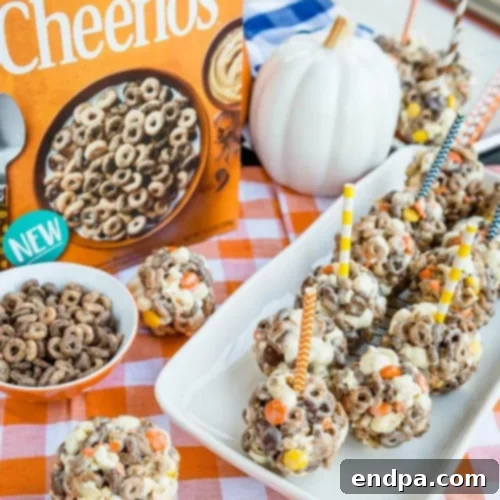 Chocolate Peanut Butter Cheerios Popcorn Balls, combining cereal and classic flavors.