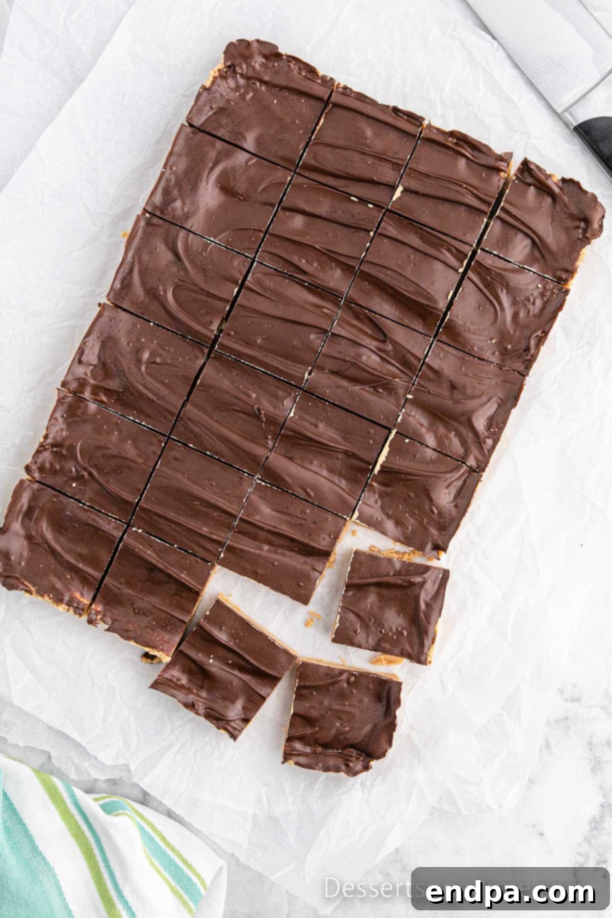 Finished Buckeye Bars, chilled and cut into neat squares, ready for serving.