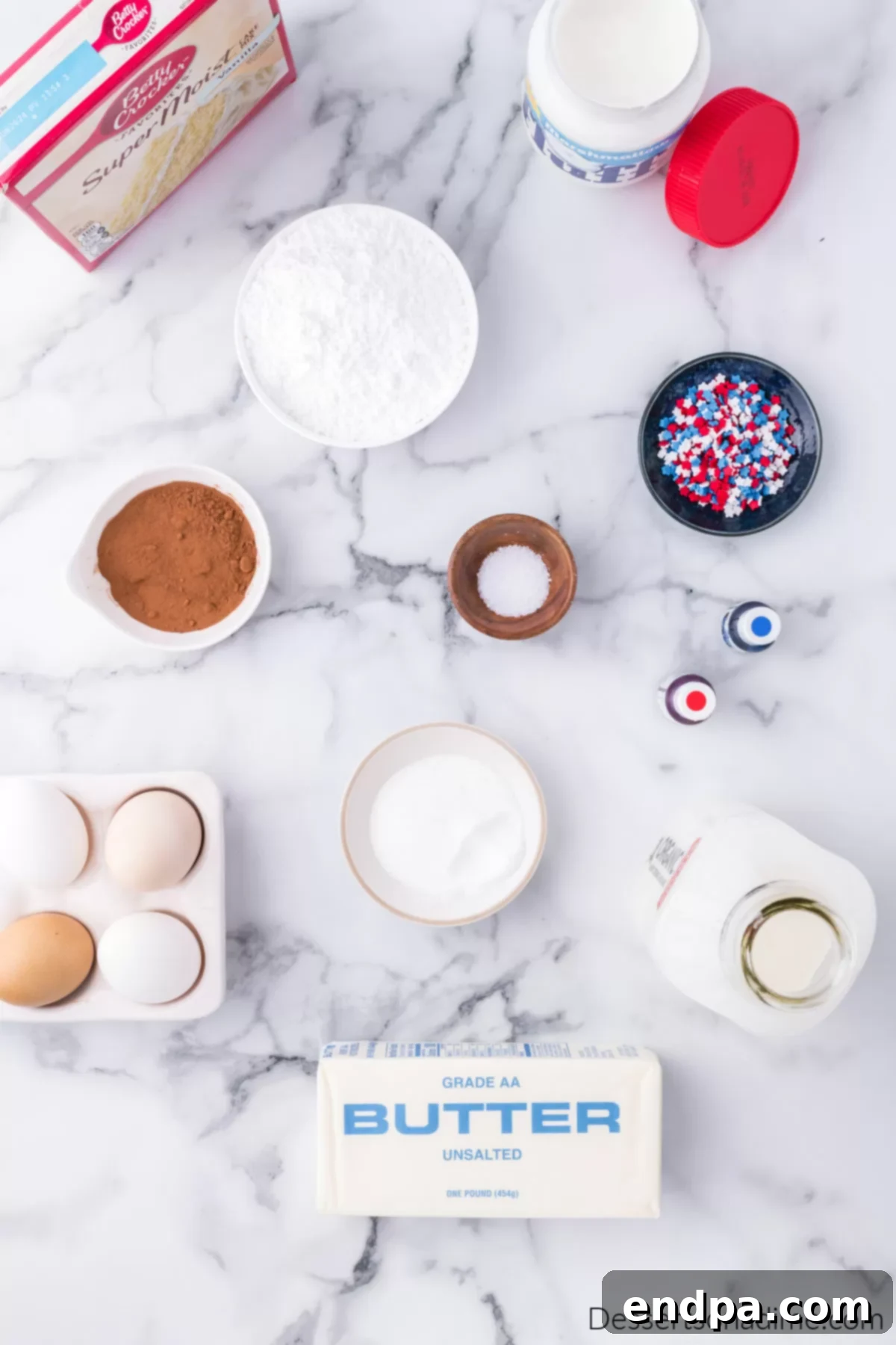 Ingredients for whoopie pies - butter, eggs, milk, cake mix, food coloring,, marshmallow fluff, powdered sugar.