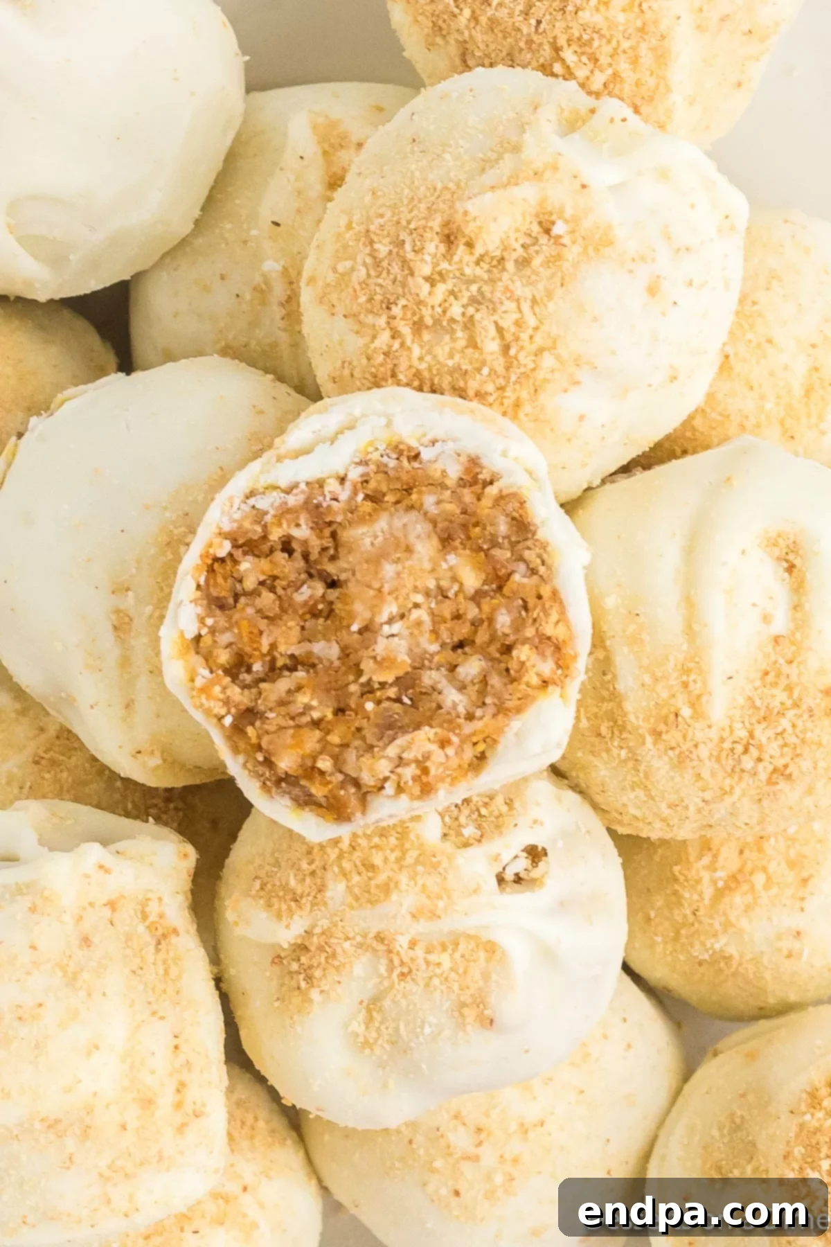 A stack of perfectly prepared pumpkin truffles on a serving platter, ready for guests.