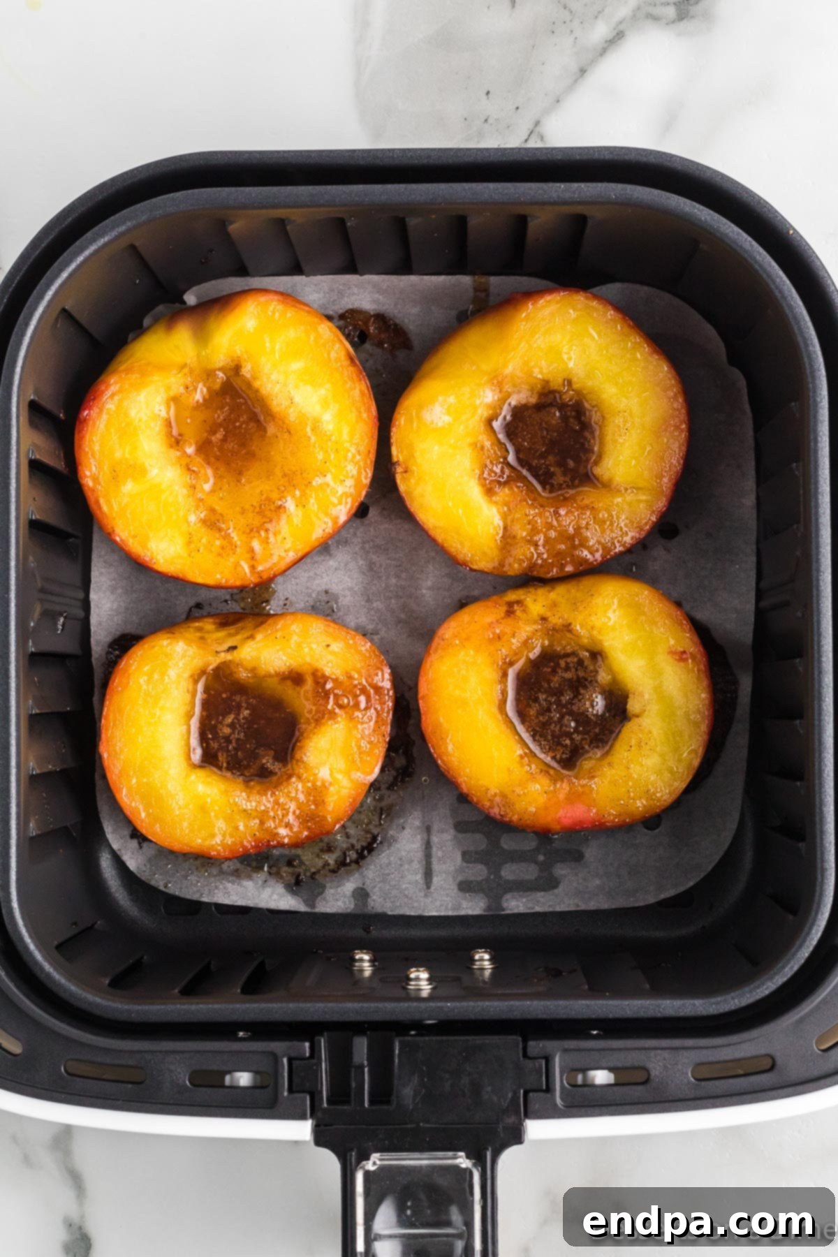 Golden Air Fryer Peaches 10 Peaches cooked in air fryer.