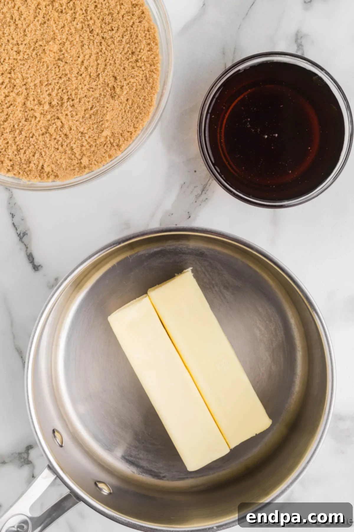 Melted butter in a large saucepan on the stove, ready for the toffee mixture.