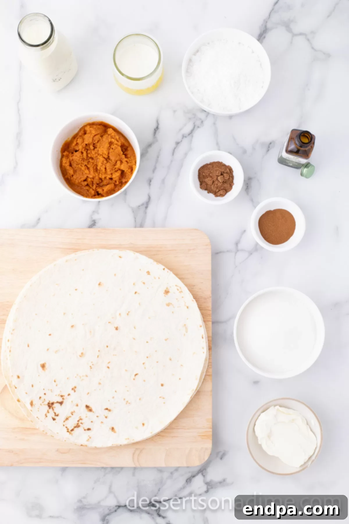 Ingredients needed for pumpkin tacos - tortillas, granulated sugar, cinnamon, butter, cream cheese, pumpkin, vanilla, heavy whipping cream and powdered sugar. 