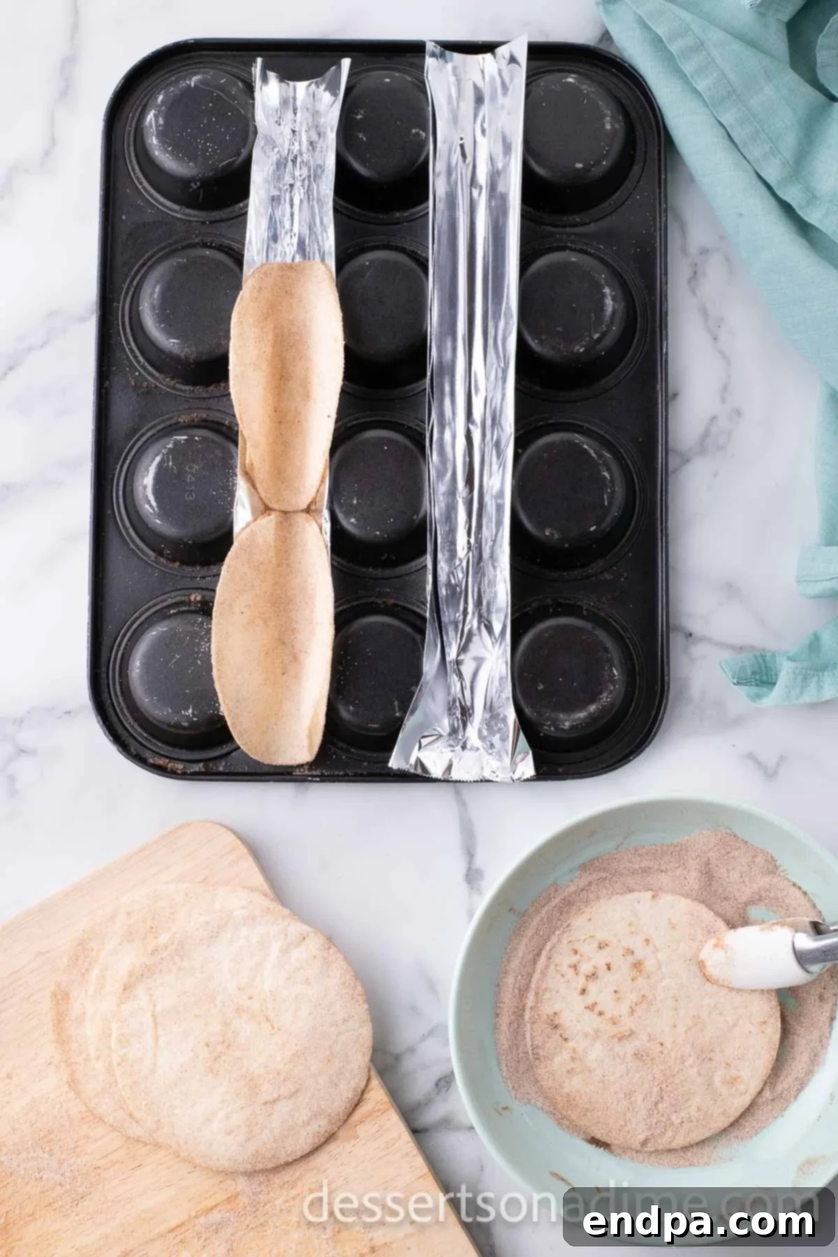 Tortillas placed on muffin pan. 