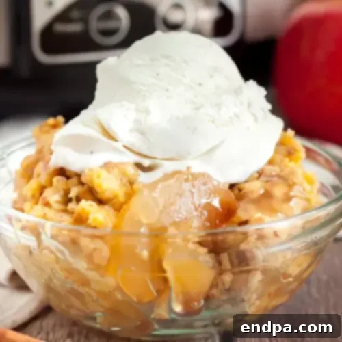 97 Effortless Autumn Delights 13 Crockpot Apple Pie Dump Cake, a simple, warm, and comforting fall dessert.