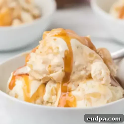 97 Effortless Autumn Delights 19 A scoop of Caramel Apple Ice Cream, showing swirls of caramel and apple chunks.