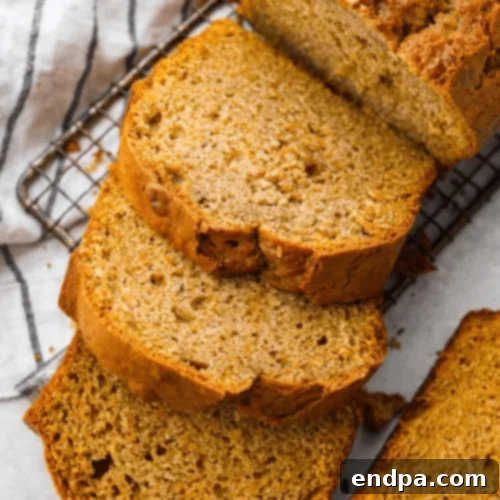 97 Effortless Autumn Delights 27 A loaf of moist Sweet Potato Bread, sliced and ready to serve.